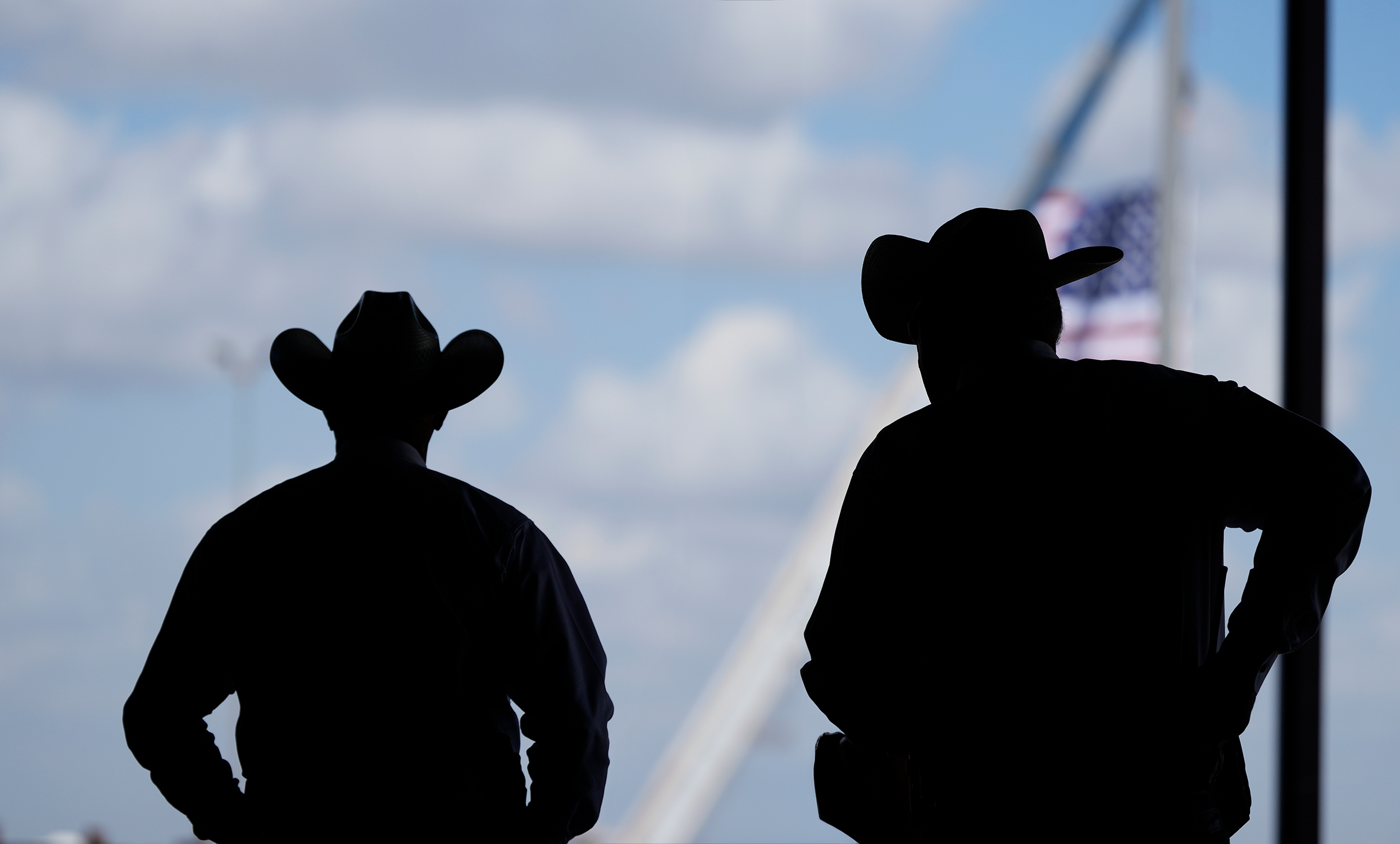 Sheriff deputies keep watch during a campaign rally for Sen. Ted Cruz Tuesday, Oct. 29, 2024, in Jourdanton, Texas. (AP Photo/Eric Gay)