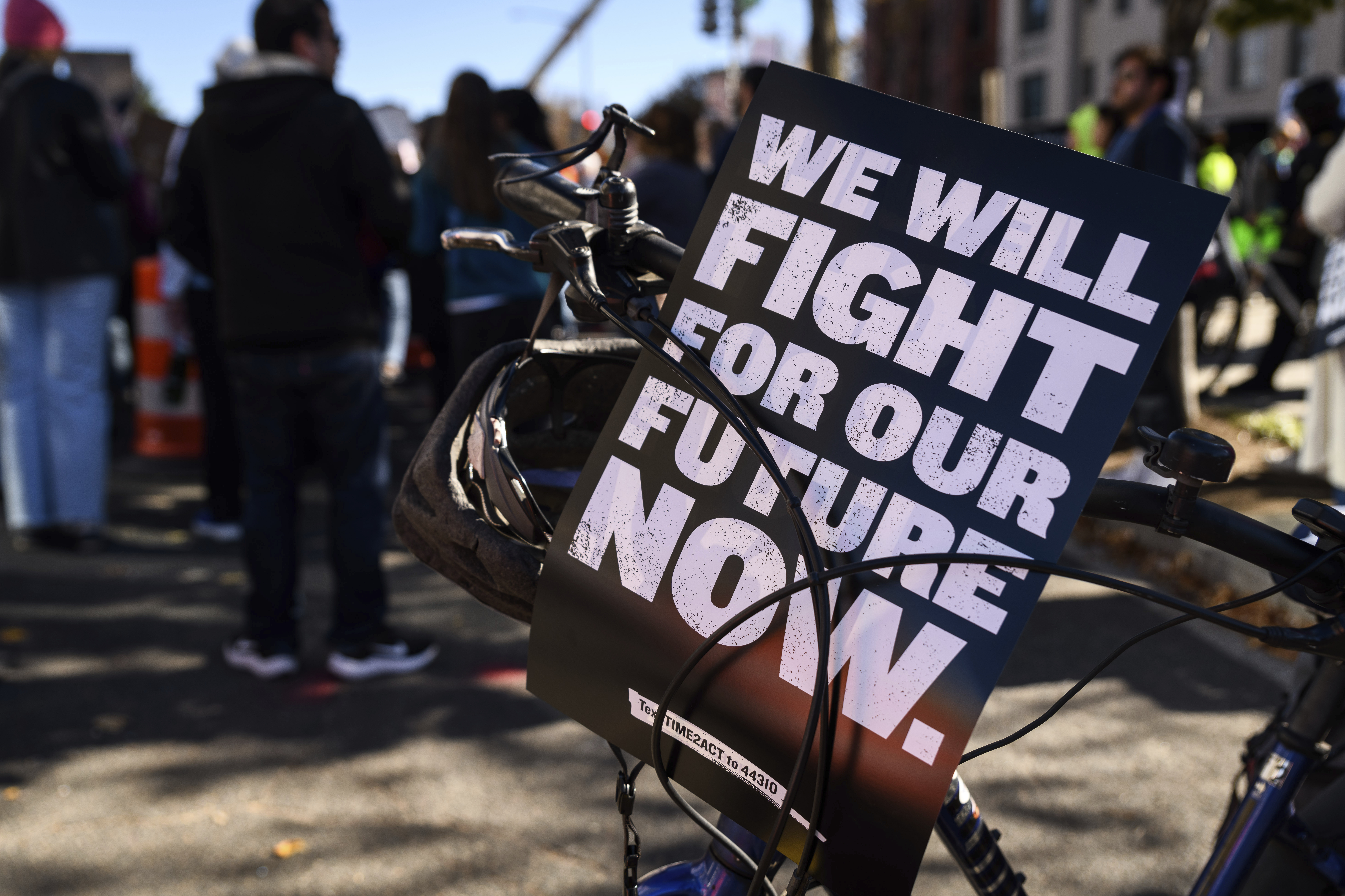 A protest sign adorns a bike on the sidelines of a demonstration against the U.S. presidential election results in Washington, D.C., on Nov. 9, 2024. Protesters gathered outside the Heritage Foundation as part of the Women's March's "Rapid Response: Time to Resist," opposing Project 2025 with messages denouncing President-elect Donald Trump and perceived threats to democracy. (Photo by Alejandro Alvarez/Sipa USA)(Sipa via AP Images)