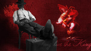 Dark red background with image of sheriff sitting down with his feet up on a briefcase and his head covered with his hat next to a red-toned Napolean Bonaparte and the words "long live the king" in the bottom right corner.